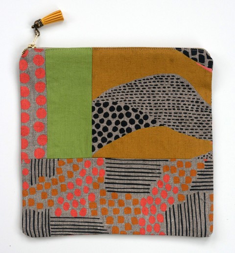 Patchwork clutch made of hand-printed fabric by Jen Hewett