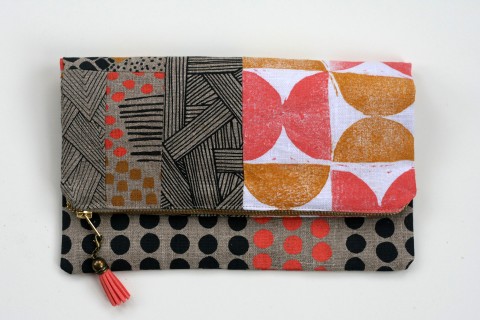 Patchwork clutch made of hand-printed fabric by Jen Hewett