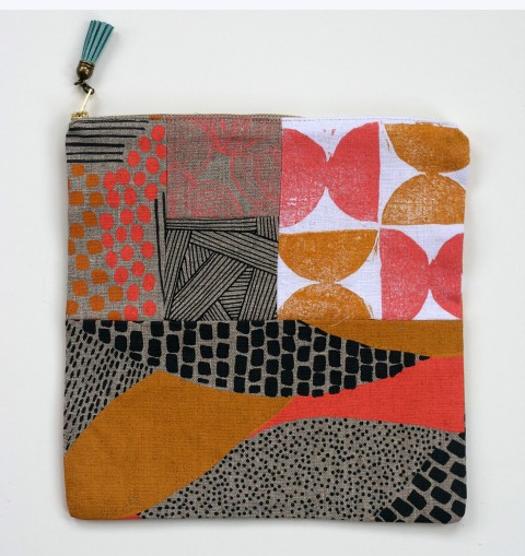 Patchwork clutch made of hand-printed fabric by Jen Hewett